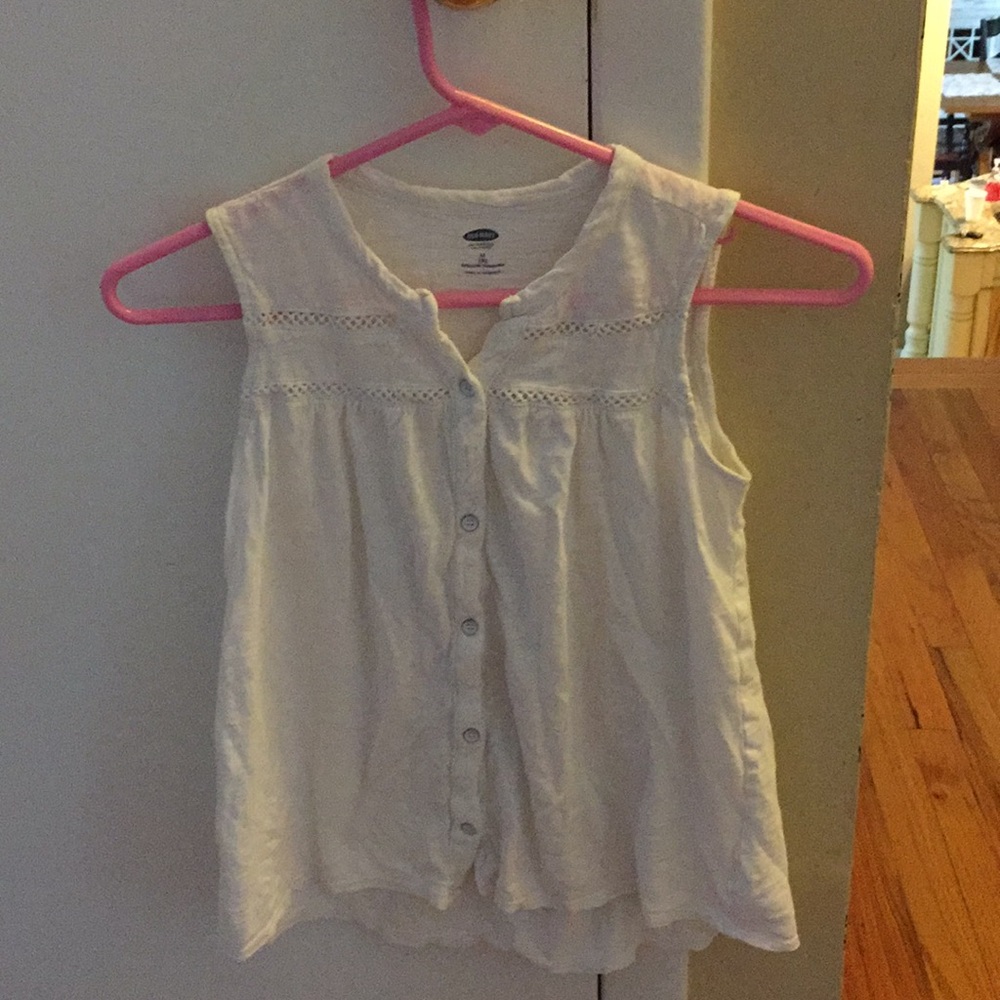 A white button-down tank top.
